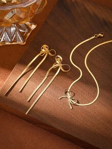 1件女士时尚简约18K镀金铜蝴蝶结颈链，无需耳洞，流苏耳夹，适合节日、派对和日常佩戴，天鹅绒袋包装 - 金色 - 查看 4