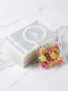 100 túi tự dính màu hồng có nơ ren, túi đựng bánh quy dễ thương, túi đựng kẹo bánh trong suốt có thể đóng mở lại, đồ dùng gói quà trang sức và quà tặng tiệc tùng thanh lịch. - Nhiều màu - Xem 3