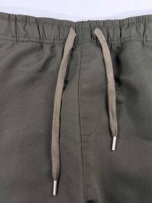 男士休闲户外工装裤，纯色踝部系带多功能口袋七分裤，简约百搭设计，配有弹性腰带和抽绳，适合作为送给丈夫或男友的礼物 - 軍綠色 - 查看 5
