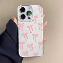 Funda con estampado de lazo rosa, compatible con teléfonos ,  17,  16 Pro Max,  15 Pro Max,  13 y  12. Fabricada en TPU, ofrece protección contra golpes y caídas. Una opción encantadora para cumpleaños, aniversarios o simplemente para darle un toque de encanto a tu estilo diario. Perfecta para familiares, amigos y cualquier persona que ame un diseño divertido y femenino. - Blanco - Ver 1