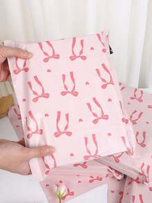 20个装心形粉色蝴蝶结红色丝带收纳袋，PE塑料邮寄袋，加厚物流袋，适用于女性、情人节、母亲节、返校季、交通运输、服装、文具、派对礼品包装，多功能包装，理想的节日礼品包装，满足您的所有需求 - 粉色 - 查看 4