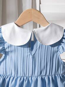 Đầm mùa hè mới cho bé gái, cổ Peter Pan, thêu hoa, tay ngắn, xếp ly, dáng chữ A, có túi. - Màu xanh lam - Xem 9