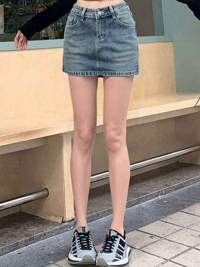 高腰纯色休闲短款牛仔裙，适合春夏穿着