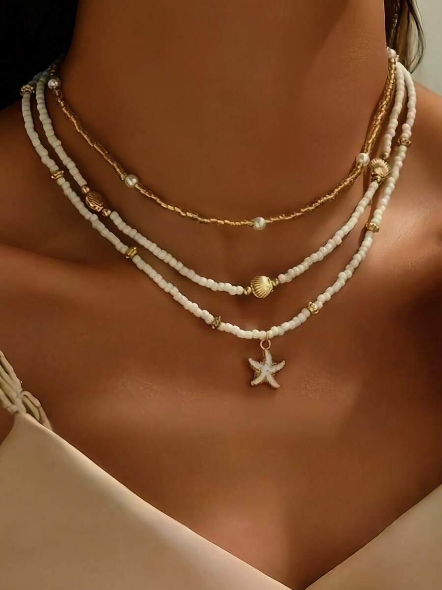 3件套简约串珠项链套装，包含仿珍珠、贝壳和海星，手工制作，充满海滩海洋风情，适合日常佩戴和度假。
