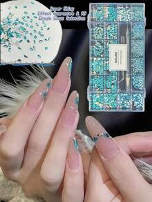 KIRAME 21 Grids DIY Manicure K9 Glass Lake Blue Flat Bottom Rhinestone Set - 30pcs High Gloss Rhinestones Per Style, Includes 1 Dotting Pen And 1 Tweezer, Nail Art Gems, Nail Salon, Home Manicure, Nail Art Supplies, Christmas, New Year, Valentine's Day Nail Art, Holiday Gift, Suitable For Crafts, Clothing, Textiles, Shoes, Glassware, Jewelry Making - Multi-Size Shiny Decorations Nails - 湖藍色 - 查看 5