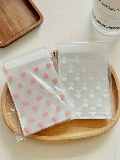 100pcs Transparent Heart Shaped Self-Adhesive Packaging Bags, Suitable For Cookies, Candies And Desserts, Also Ideal For Gift And Souvenir Packaging, Perfect For Valentine's Day, Weddings And Other Celebrations