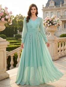 Đầm dài tay cổ chữ V dáng chữ A thanh lịch dành cho nữ, được làm từ vải dệt, có chi tiết xẻ tà và khóa kéo, vạt xòe nhẹ, thích hợp cho mùa xuân. - Màu xanh Bạc hà - Xem 3