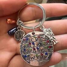 TV Series Themed 26 Letters Stainless Steel Keychain, Bag Pendant [Random Style] - Multicolor - View 2