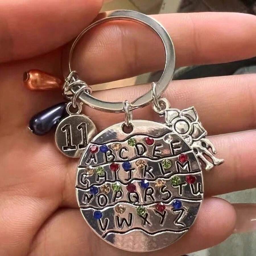 TV Series Themed 26 Letters Stainless Steel Keychain, Bag Pendant [Random Style] - Multicolor - View 1