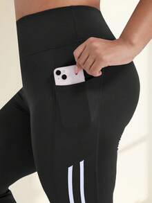 大码女式高腰提臀喇叭瑜伽裤，侧边饰有白色条纹，阔腿设计，带侧袋，适合休闲、运动、跑步和训练。 - 黑色 - 查看 3