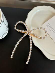 1件金属水钻珍珠蝴蝶结装饰弹簧夹发饰，适合女士日常发型装饰，优雅百搭，适用于情人节、约会、派对等场合，可作为头饰或派对配饰。 - 金色 - 查看 2