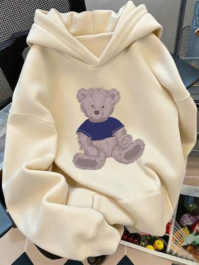Sudadera de mujer con estampado de oso de dibujos animados Sudadera con capucha y bolsillos con estampado de oso de dibujos animados. Sudadera con cordón, cálida y cómoda, de color liso, informal, para mujer.
