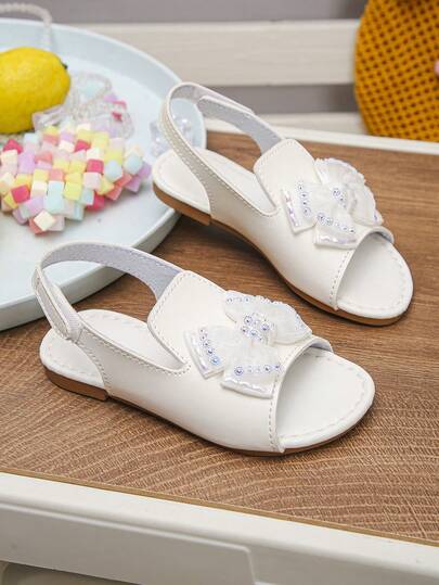 1 Pair Girls' Spring & Summer New Bowknot Rhinestone Soft Sole Open Toe Flat Princess Sandals, Children's Versatile Anti-Slip Roman Shoes Suitable For Travel, Vacation And School Wear