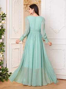 Đầm dài tay cổ chữ V dáng chữ A thanh lịch dành cho nữ, được làm từ vải dệt, có chi tiết xẻ tà và khóa kéo, vạt xòe nhẹ, thích hợp cho mùa xuân. - Màu xanh Bạc hà - Xem 2