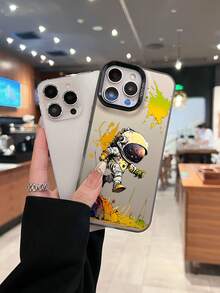 Astronauta salta con coloridas salpicaduras de pintura espacial. Esta elegante funda es compatible con los modelos  17, 16, 15, 14 Pro Max, 13, 12, 11, XR y XS Plus. Fabricada en silicona TPU, ofrece protección contra golpes y caídas, además de una sensación superior. Es un regalo ideal para familiares, amigos y seres queridos, y una opción perfecta para Año Nuevo. - Negro - Ver 1