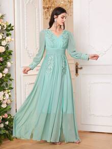 Đầm dài tay cổ chữ V dáng chữ A thanh lịch dành cho nữ, được làm từ vải dệt, có chi tiết xẻ tà và khóa kéo, vạt xòe nhẹ, thích hợp cho mùa xuân. - Màu xanh Bạc hà - Xem 5