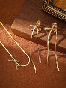 1件女士时尚简约18K镀金铜蝴蝶结颈链，无需耳洞，流苏耳夹，适合节日、派对和日常佩戴，天鹅绒袋包装 - 金色 - 查看 5