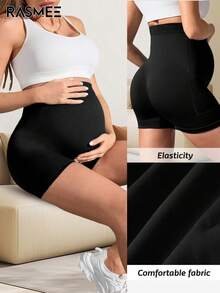 无缝孕妇瑜伽短裤，三合一设计，采用无缝针织技术，极致舒适，简约黑色，高弹腹部面料，高腰支撑，通勤、运动、瑜伽、居家及健身的理想之选。