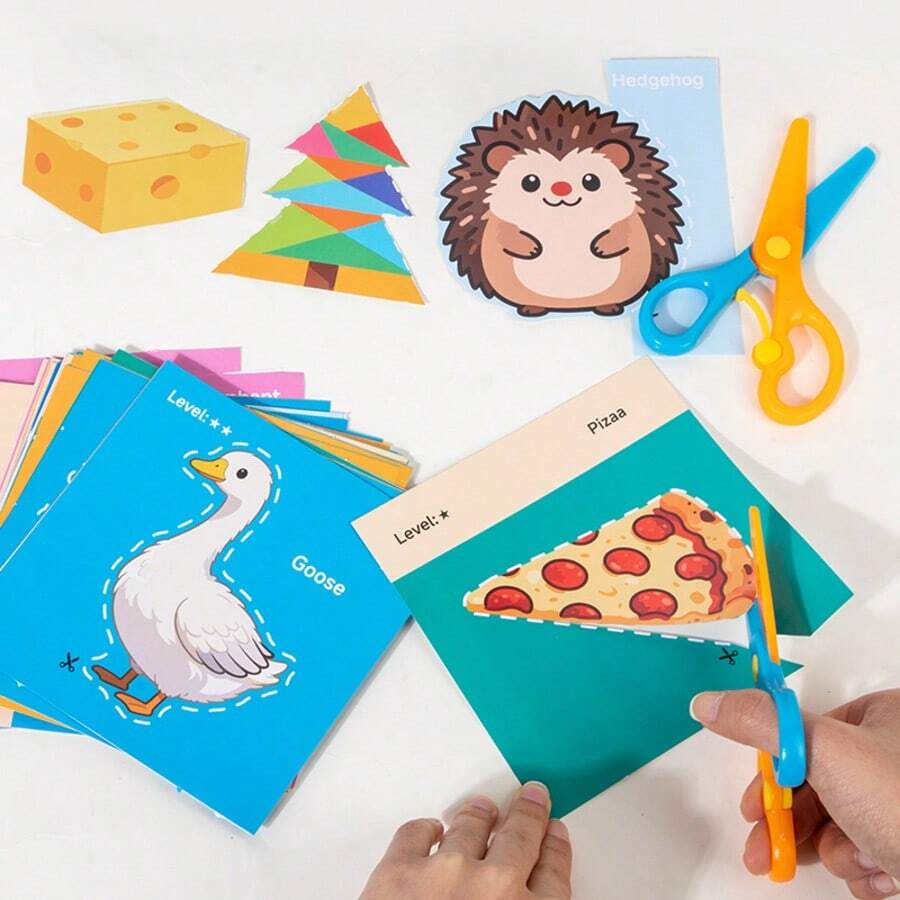 儿童剪纸手册 DIY 幼儿园手册 专注力训练 制作儿童剪纸 趣味折纸玩具 锻炼专注力 手部精细动作 益智玩具 亲子互动桌面玩具 入门级男孩女孩动手材料玩具 幼儿园儿童剪纸手册 DIY 材料包 手眼协调精细动作专注力训练玩具