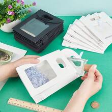 Túi quà tặng trong suốt kiểu dáng đơn giản và thời trang, có nắp gập và nơ trang trí, túi trưng bày trong suốt đựng hoa, quà tặng, thích hợp để cất giữ đồ dùng trong nhà, làm quà tặng, quà văn phòng, quà cưới, quà tặng cho bạn bè, gia đình, thầy cô, người lớn tuổi. - Nhiều màu - Xem 5