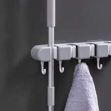 1个浴室拖把架壁挂式挂钩，无需钻孔即可收纳拖把，适用于浴室