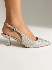DECOLTE BASSE APERTE AL RETRO IN PU EFFETTO GLITTER CON STRASS. MOLTO ELEGANTI ! CON TACCO 6.5 CM - Silver - View 1