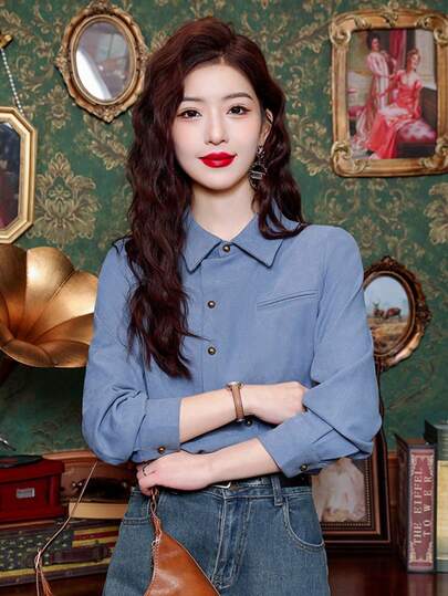 Women's Vintage Plaid Long-Sleeved Shirt With A Polo Collar And Chest Pocket - Red Plaid Pattern, Paired With Brown Belted Jeans, Red Lipstick, Elegant Home Decor, And A Vintage Shirt.