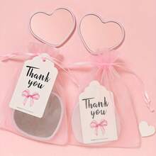 18pcs/6sets Pink Mirror Card Pouch Set, Includes 6 Mirrors, 6 Zipper Pouches And 6 Thank You Cards. The Set Contains A Heart-Shaped Makeup Mirror, A Clear Bag, And A Cute Portable Small Mirror, Perfect As A Wedding Or Party Gift.