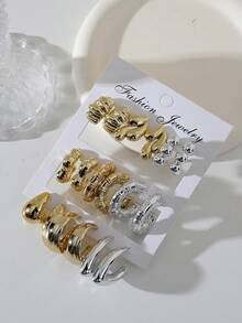 1-9 对金银混合几何亮面耳夹，采用优质树脂材料制成，适合日常通勤佩戴。 - 金色 - 查看 2