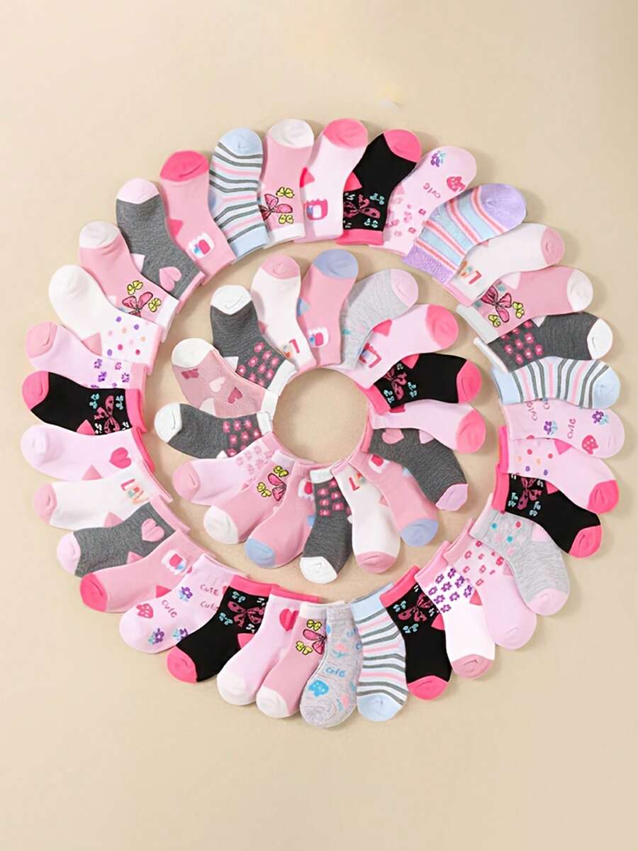 10双女婴可爱混色中筒袜，包含蝴蝶、爱心、花朵、波点、条纹等图案，透气弹力袜口，四季皆宜，是新生儿的理想礼物。 - 彩色 - 查看 1