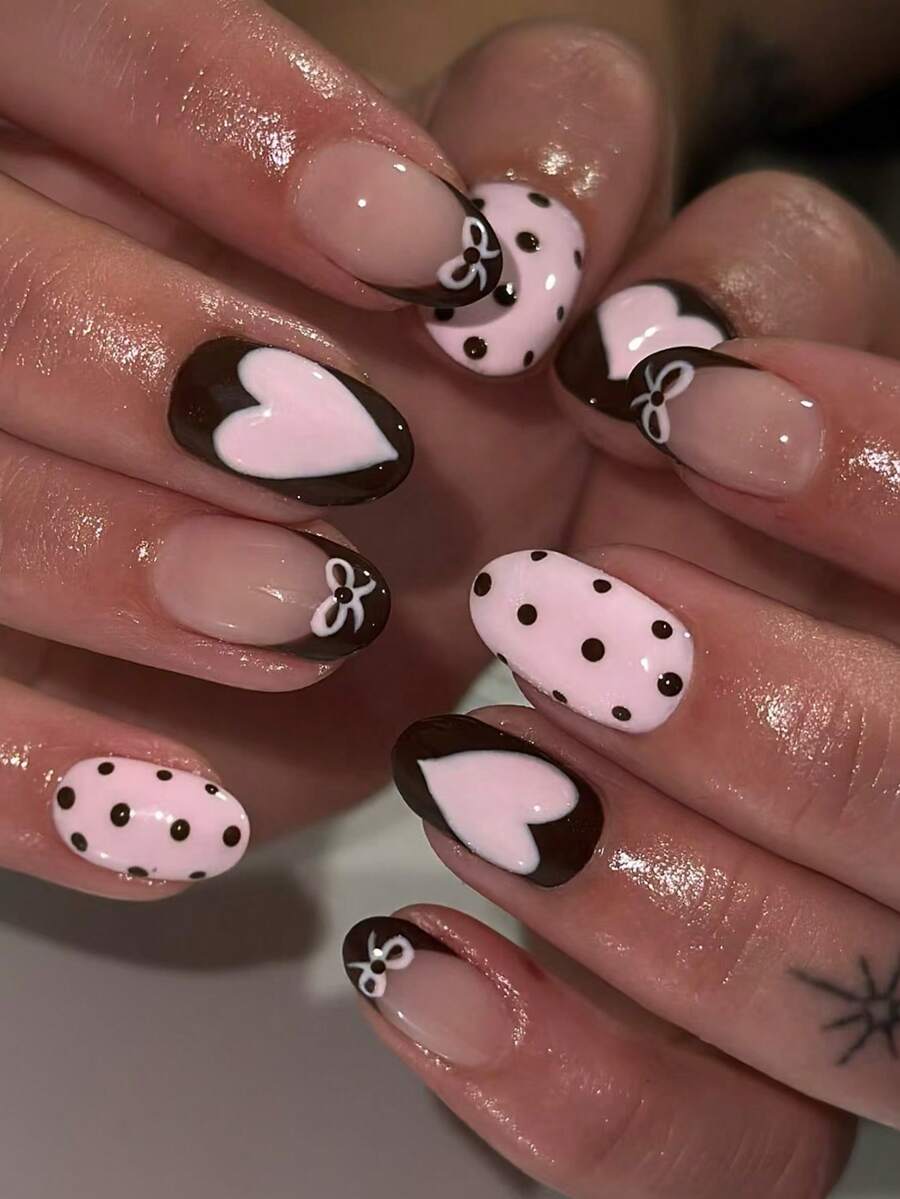 24片Y2K短椭圆形蝴蝶结黑色法式美甲贴纸，饰以粉色爱心和波点图案，完美适配亚克力美甲套装，包含：1片凝胶指甲油和1个指甲锉，适合情人节美甲和法式美甲，是女性和女孩日常工作、学习和派对使用的理想之选。 - 查看 1