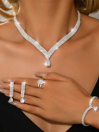 Juego de joyería de 4 piezas con colgante, aretes, pulsera y anillo con cristales multicapa elegantes y brillantes en forma de gota de agua, accesorios para vestido de novia, de fiesta y de noche para mujeres