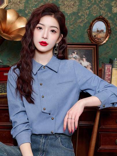 Women's Vintage Plaid Long-Sleeved Shirt With A Polo Collar And Chest Pocket - Red Plaid Pattern, Paired With Brown Belted Jeans, Red Lipstick, Elegant Home Decor, And A Vintage Shirt.