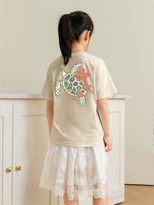 Camiseta de manga corta con cuello redondo y estampado casual para niñas preadolescentes y estudiantes, top de verano - Albaricoque - Ver 2