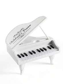 This Mini Piano For Kids Has A One-Touch Multi-Function Mode, Built-In Multiple Songs, And 24 Black And White Keys That Can Simulate The Playing Experience Of An Electronic Keyboard. It Is An Interactive Sound And Light Music Toy For Parent-Child Activities, And Also An Ideal Christmas Gift For Children Aged 3-12 Years Old.