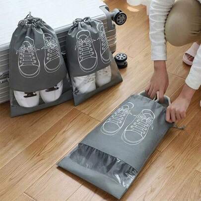 5pcs Dustproof Shoe Covers, Portable Shoe Organizing Drawstring Pouch, Essential Travel Shoe Storage Bag Made Of Non-Woven Fabric, Moisture-Proof Packaging Bag, Suitable For Home And Travel Use.