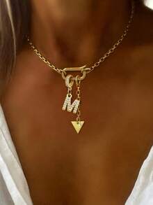 1件STYLEVER金色字母吊坠项链，配以水钻三角形吊坠和不锈钢链，适合工作、日常生活、派对、宴会和舞会等场合，尽显奢华气质。 - 金黃色 - 查看 27