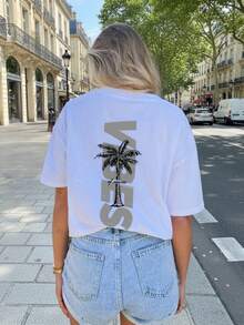 女士时尚夏季圆领短袖T恤，柔软舒适，休闲百搭。印花图案灵感源自度假风情的棕榈树和英文字母，散发青春活力。适合度假、跑步、休闲、聚会、派对等各种场合。宽松的街头风设计，也适合户外穿着，是夏季穿搭的理想之选。 - 白色 - 查看 2