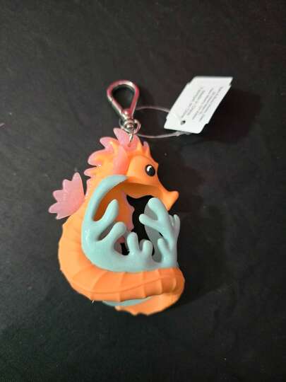 1  Encantador    Llavero Porta Gel   Silicona    En Forma de Caballito de Mar