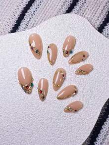 10片手工杏仁形美甲贴纸，饰以不对称3D金色线条和彩色水钻。这些美甲贴纸采用手工绘制的不对称3D金色线条和闪亮的彩色水钻，完美平衡了优雅与浪漫。简约而精致的设计散发出低调奢华而又略带性感的气息。 - 彩色 - 查看 6