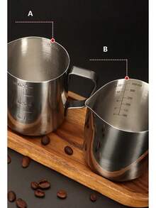 Jarra de espuma de café de acero inoxidable con boquilla afilada graduada, taza de espumador de leche, jarra de leche para arte de latte y herramientas de preparación de café - Estilo B 350 ml - Ver 5