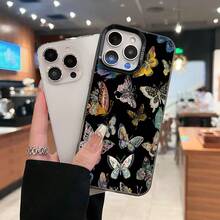Mariposas de colores sobre fondo negro. Esta elegante funda es compatible con los modelos  17, 16, 15, 14 Pro Max, 13, 12, 11, XR y XS Plus. Fabricada en silicona TPU, ofrece protección contra golpes y caídas, además de una sensación superior. Es un regalo ideal para familiares, amigos y seres queridos, y la elección perfecta para Año Nuevo. - Negro - Ver 3