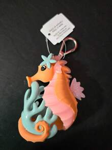 1  Encantador    Llavero Porta Gel   Silicona    En Forma de Caballito de Mar