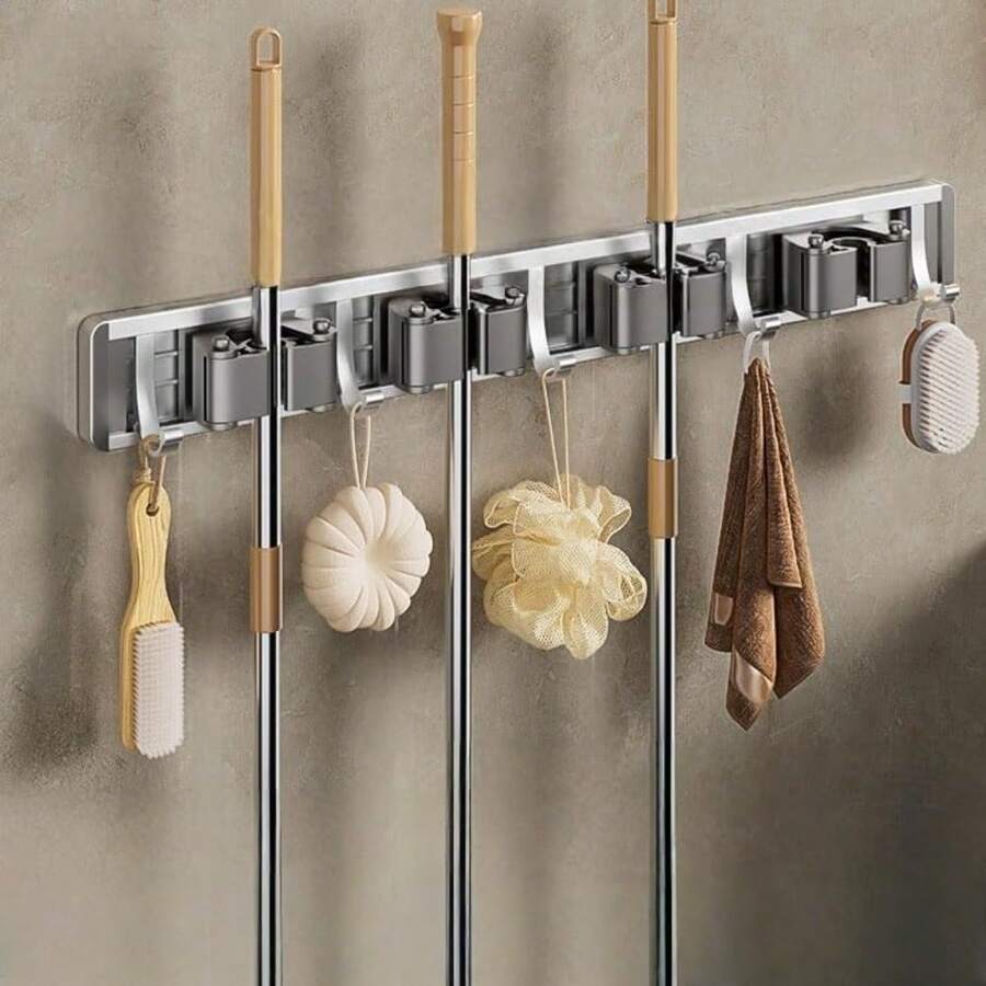 CYPNGanchos Multiuso Organizador de Escobas y TrapeadoresEstantes para Organizadores de Cocinas y Armarios con 4 Estantes y 5 Ganchos Ajustables para Trapos Cepillos Fácil Instalación y ResistenteFashion - 219765625 - Ver 1