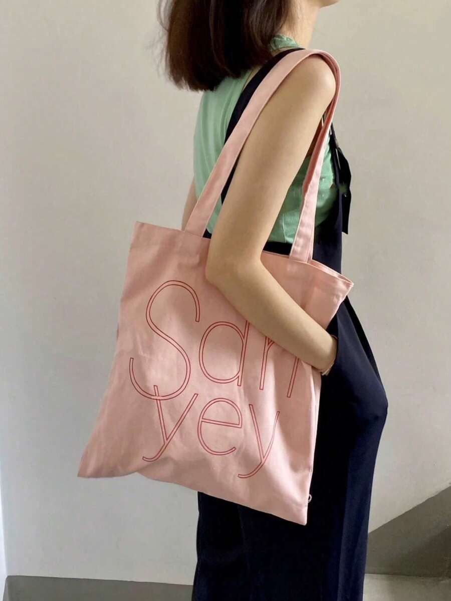 粉色與紅色聖誕主題禮物袋，印花肩背帆布購物袋