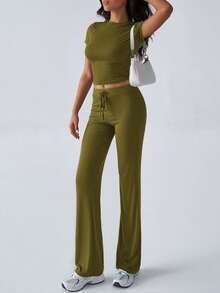 Bộ đồ thể thao mùa hè phong cách Y2K dành cho nữ của GAOVOT, bao gồm áo thun cổ tròn tay ngắn màu trơn và quần ống đứng ôm sát. - Màu xanh Ô liu - Xem 6