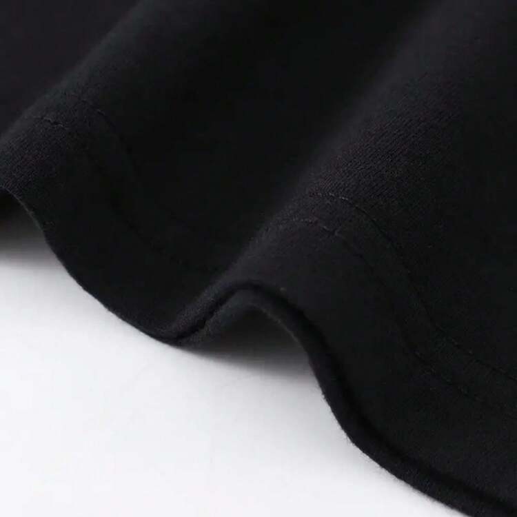 Camiseta con estampado de botas vaqueras con flores, cuadrícula y colores brillantes - Negro - Añade 3