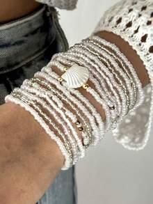 Bộ 17 vòng tay đính hạt nhựa và vỏ sò màu hồng phong cách Bohemian dành cho nữ. - Hồng - Xem 4