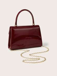 Noctella 这款亮泽的酒红色PU手提包饰有金属点缀，散发着奢华优雅的气息，是晚宴活动的理想配饰。其光泽的PU材质和精致的金属细节，完美衬托婚礼、盛大晚宴和派对等正式场合，为您的着装增添一抹优雅。同时，它也是馈赠品味高雅女性的绝佳礼物。 - 酒紅色 - 查看 8