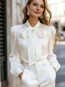 Áo kiểu nữ thanh lịch màu trắng dệt kim, tay dài, cổ buộc dây, có cúc cài. - trắng - Xem 1